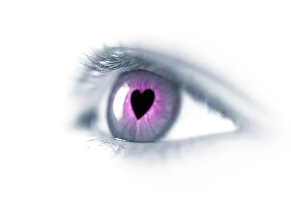 Apaixone-se / Jovem olho bonito com coração / macro — Fotografia de Stock