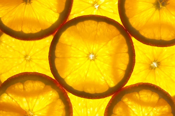 Fundo de fatias de laranja / macro / back lit — Fotografia de Stock