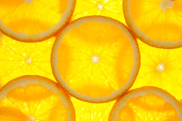 Orange slices background / macro / back lit — Stock Photo, Image