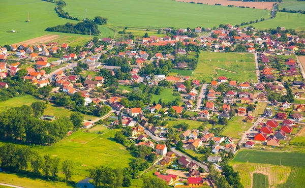 Aerial view of countryside with village and farmland — Stock Photo, Image