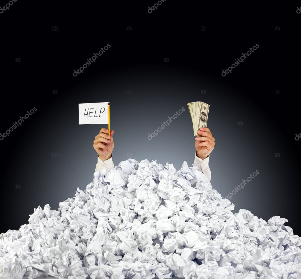 Help me! Person under crumpled pile of papers with a help sign a