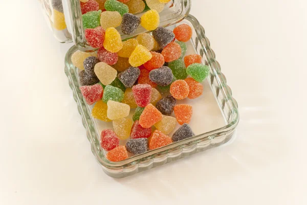 Bottle with fruit candies — Stock Photo, Image