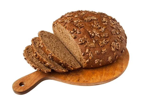 stock image Sliced bread loaf on a board