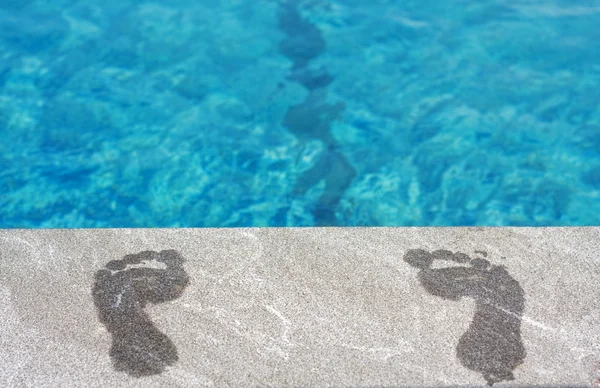 stock image Feet by the swimming pool