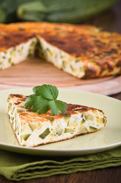 stock image Italian omelette with zucchini.