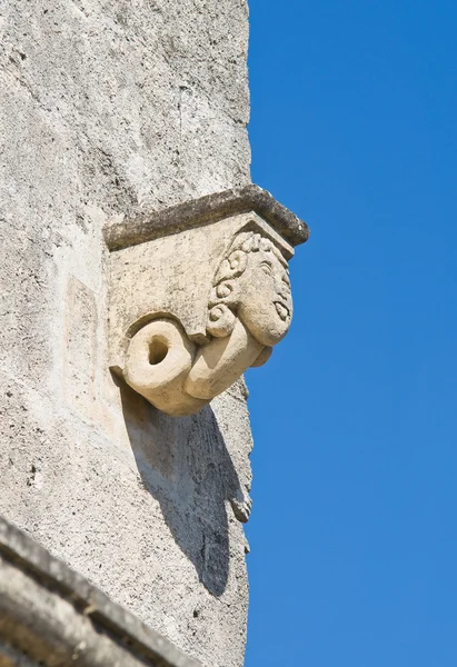 Stone face on wall. — Stock Photo, Image