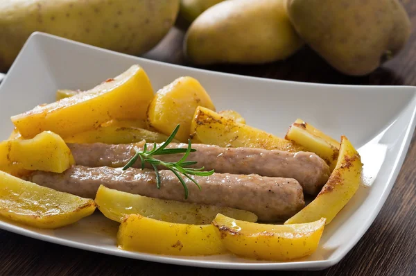 Sausage and potatoes. — Stock Photo, Image