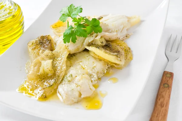 Fish with potatoes. Stock Picture