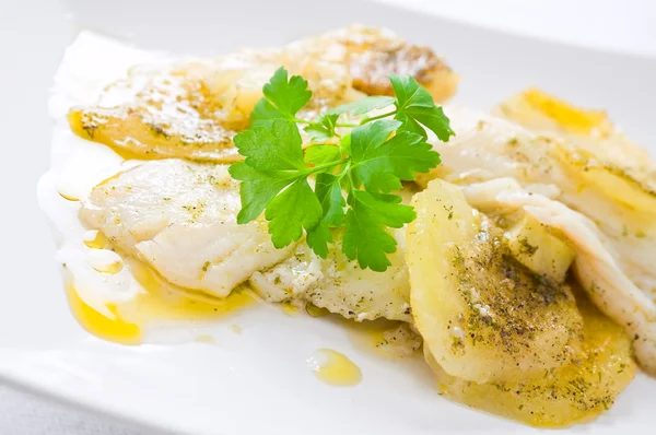 Fish with potatoes. Royalty Free Stock Photos