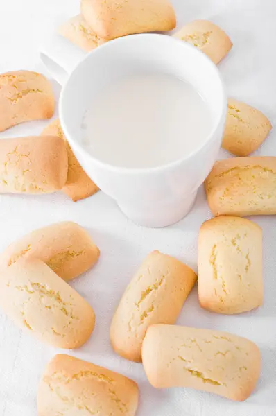 Stock image Homemade biscuits with milk cup.