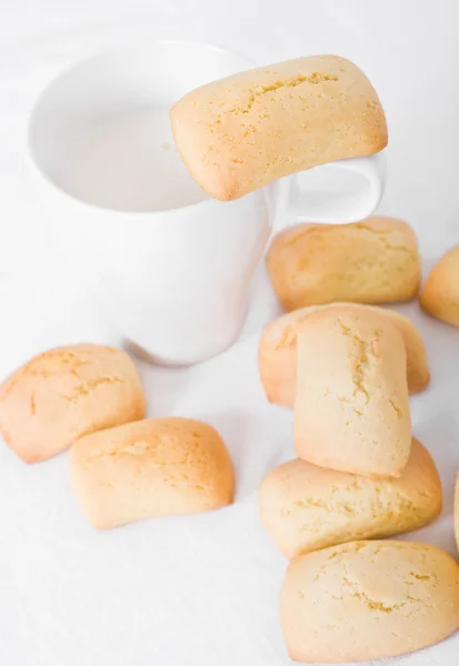 stock image Homemade biscuits with milk cup.