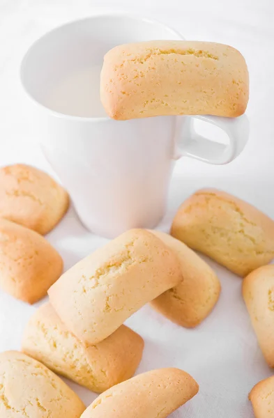 Stock image Homemade biscuits with milk cup.