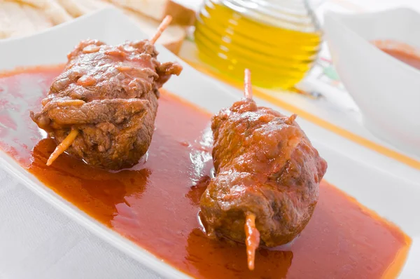 stock image Meat roulade on white dish.