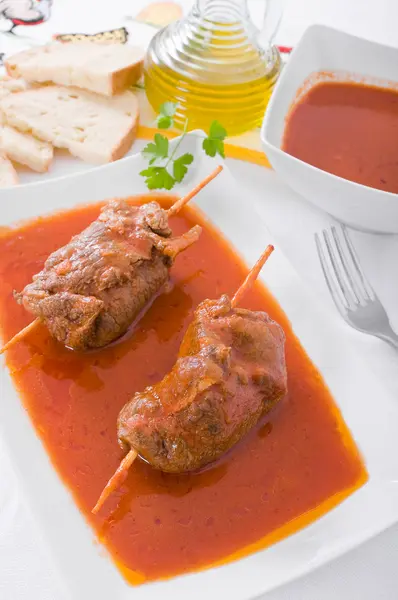 Meat roulade on white dish. — Stock Photo, Image