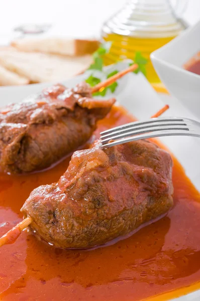 stock image Meat roulade on white dish.