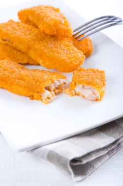 Fried fish sticks. clipart