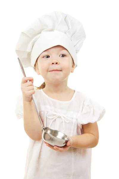 Niña en el sombrero de cocinero — Foto de Stock