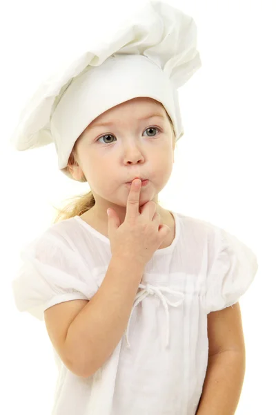 Дитяча дівчинка в капелюсі кухаря Ліцензійні Стокові Фото