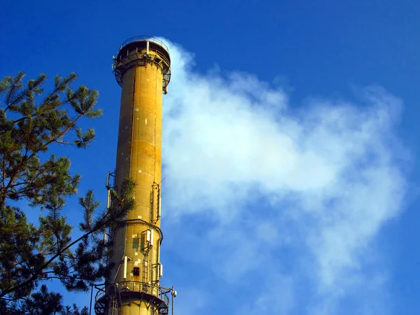 Chimney against a blue sky — Stock Photo, Image