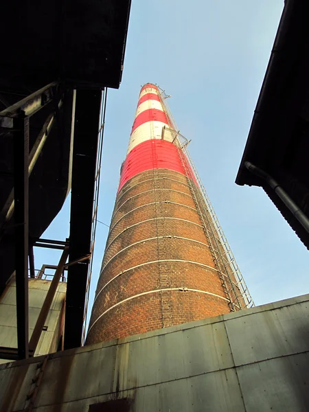 Old red and white industrial chimneys — Stock Photo, Image