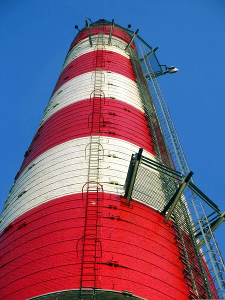 Old red and white industrial chimneys — Stock Photo, Image