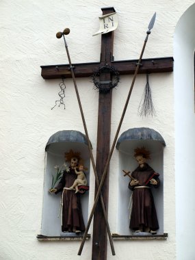 Old wooden cross and religious figures clipart