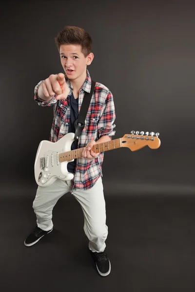 Male with a guitar pointing at you — Stock Photo, Image