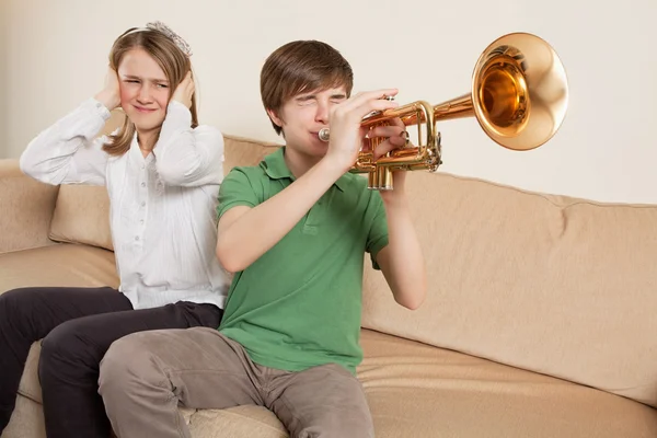 Annoying trumpet player — Stock Photo, Image