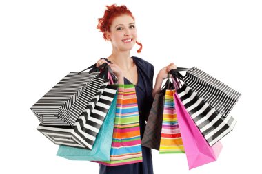 Beautiful woman holding colorful bags clipart