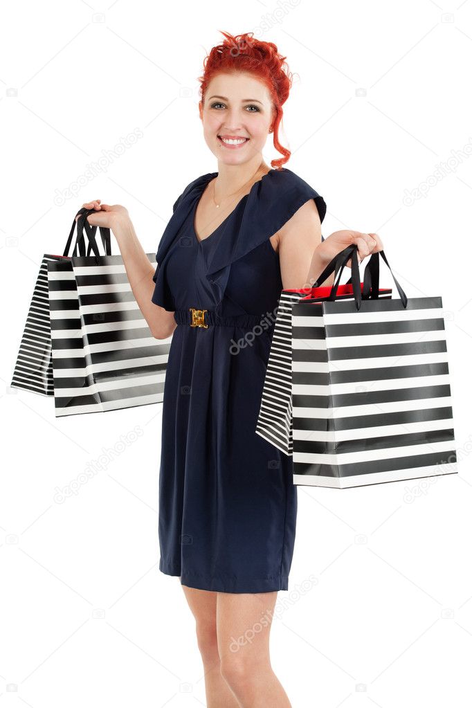 Happy shopper showing her bags