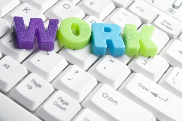 Arbete ord gjort av färgglada bokstäver — Stockfoto