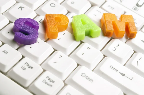 Palabra de spam hecha por letras coloridas — Foto de Stock
