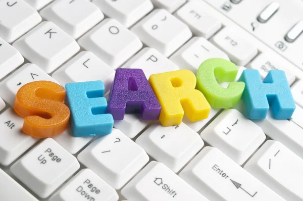 Search word made by colorful letters — Stock Photo, Image