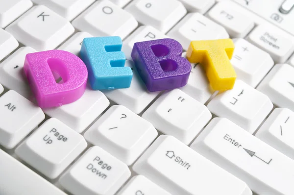 Mot de la dette faite par des lettres colorées — Photo
