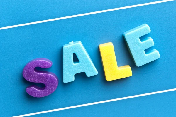 Sale word on blue board — Stock Photo, Image