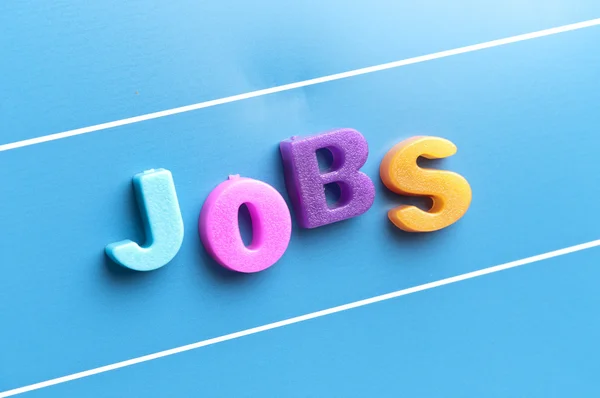 Jobs palavra na placa azul — Fotografia de Stock