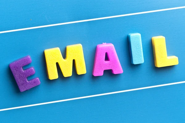 Palabra de correo electrónico en el tablero azul —  Fotos de Stock