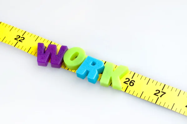 stock image Work word on cm ruler