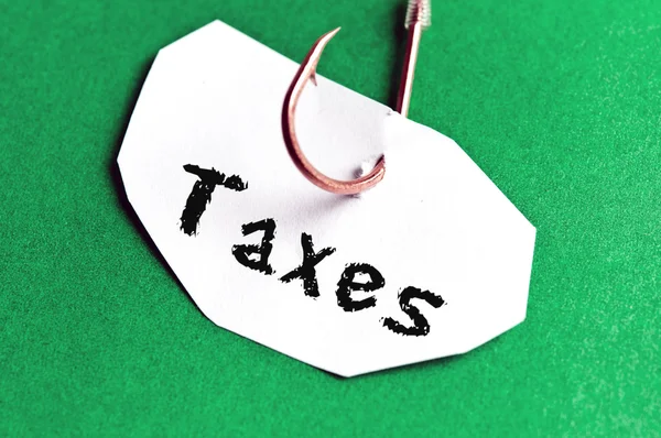 Taxes message on paper — Stock Photo, Image