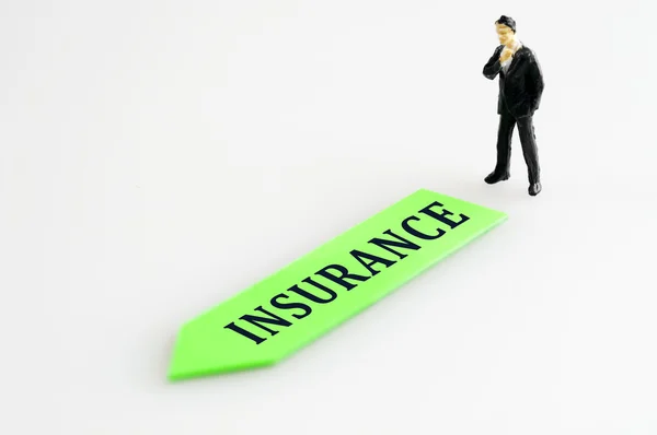 Insurance direction and toy business man — Stock Photo, Image
