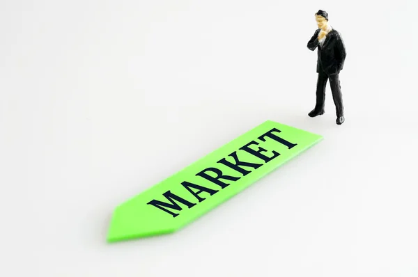 Market direction and toy business man — Stock Photo, Image