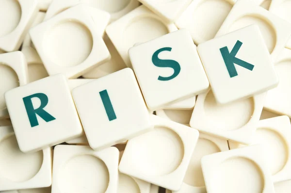 Risk word made by leter pieces — Stock Photo, Image