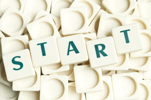 Start word made by leter pieces — Stock Photo, Image