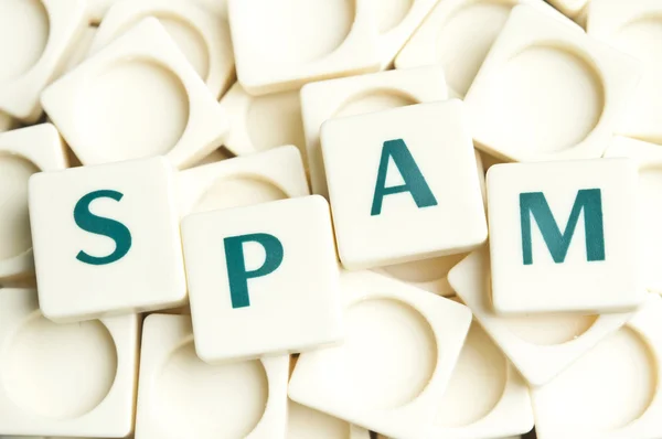 Palabra de spam hecha por piezas de letras — Foto de Stock