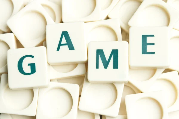 Palabra de juego hecha por piezas de letras — Foto de Stock