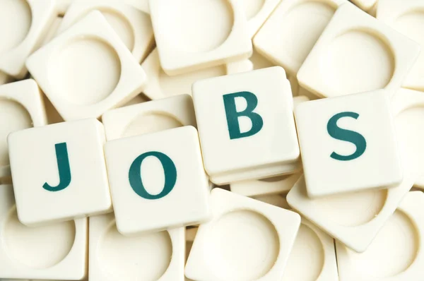 Jobs palavra feita por pedaços de leter — Fotografia de Stock