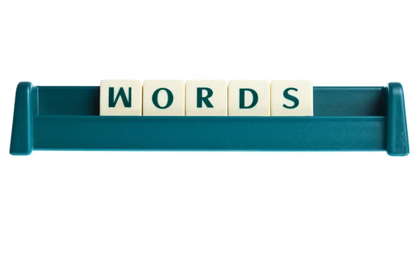 Palabras en el tablero de letras aisladas — Foto de Stock