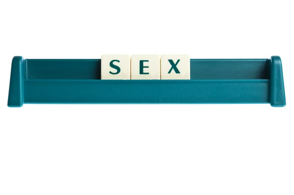 Sexo palabra en aislado letras tablero — Foto de Stock