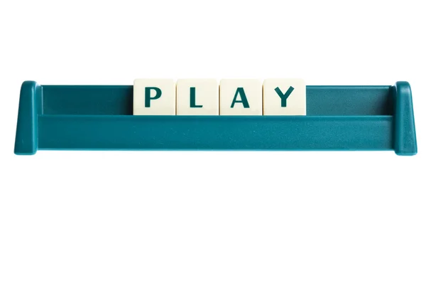 Woord spelen op geïsoleerde brieven bord — Stockfoto