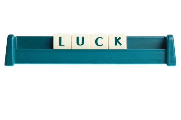Palavra da sorte em cartas isoladas bordo — Fotografia de Stock